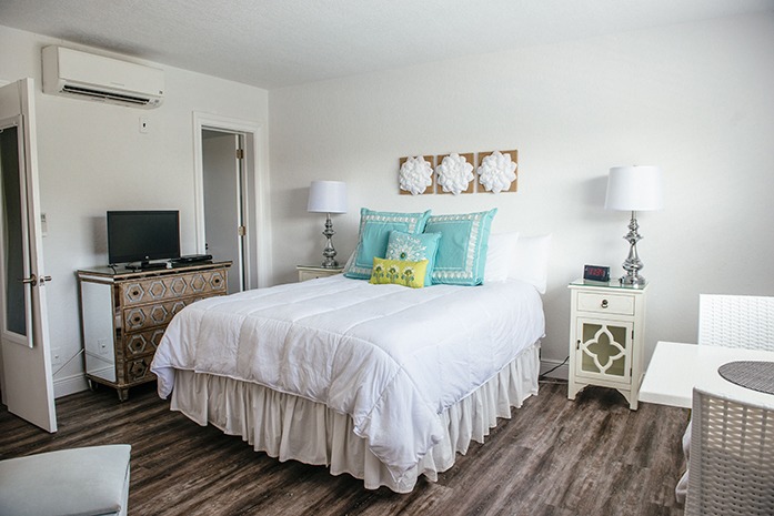 Sea Spray Inn. This is a closeup picture of a pool-side studio bed with Sea Spray Inn. This is a closeup picture of a pool-side studio bed with