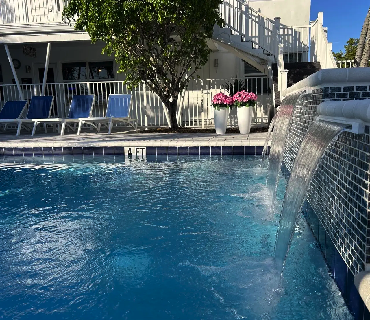 Newly renovated pool with waterfall features at Sea Spray Inn Lauderdale-by-the-Sea Newly renovated pool with waterfall features at Sea Spray Inn Lauderdale-by-the-Sea